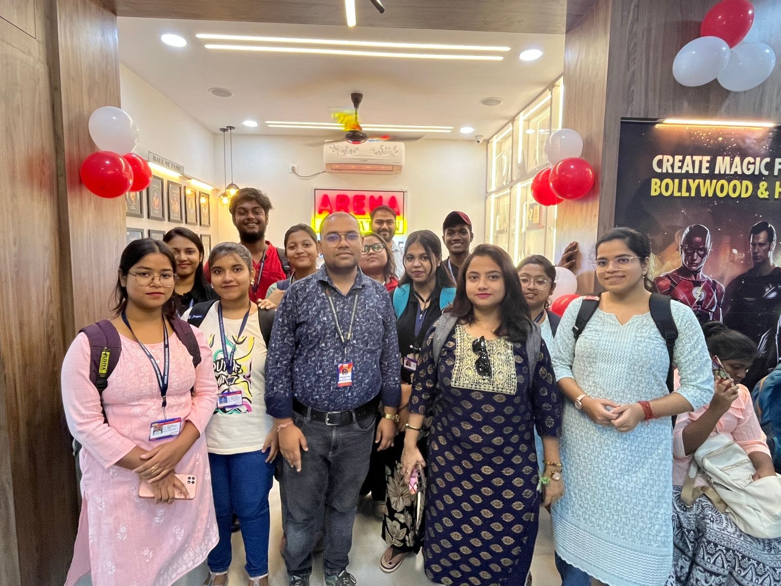 Students with faculty at entrance