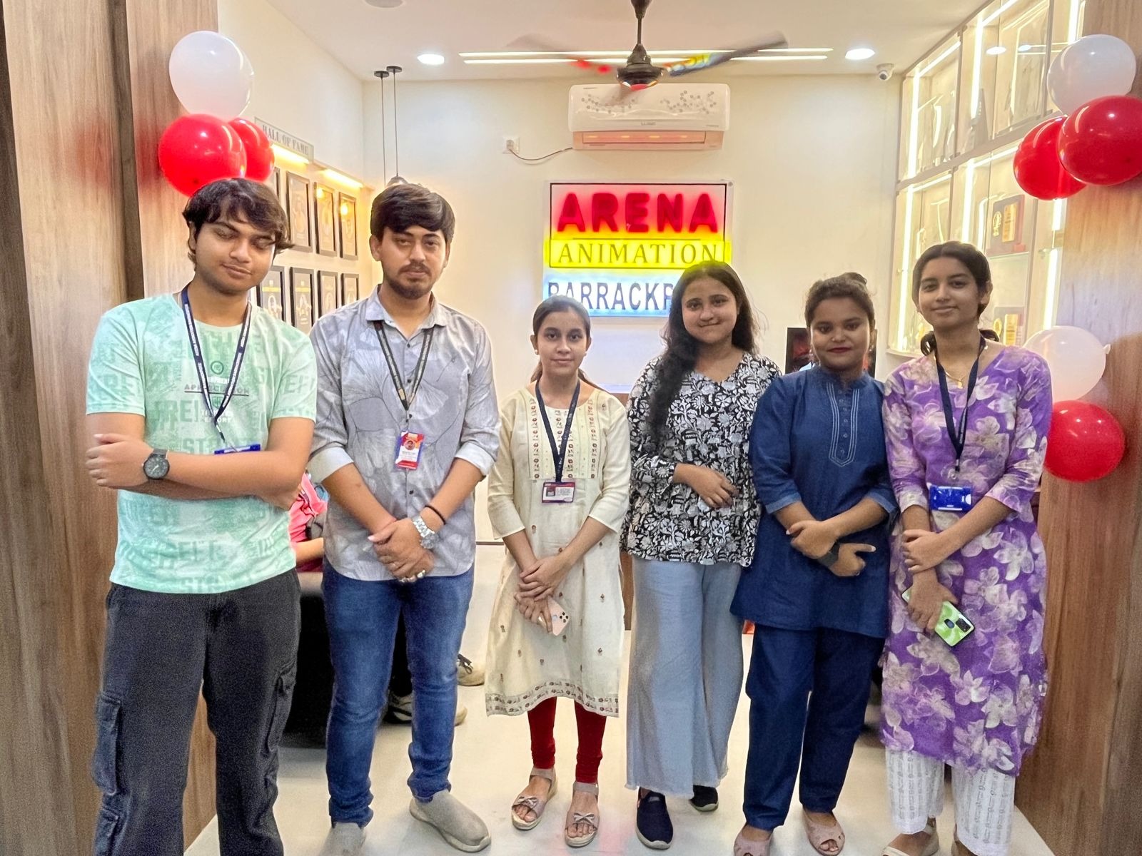Students at Arena Animation signboard