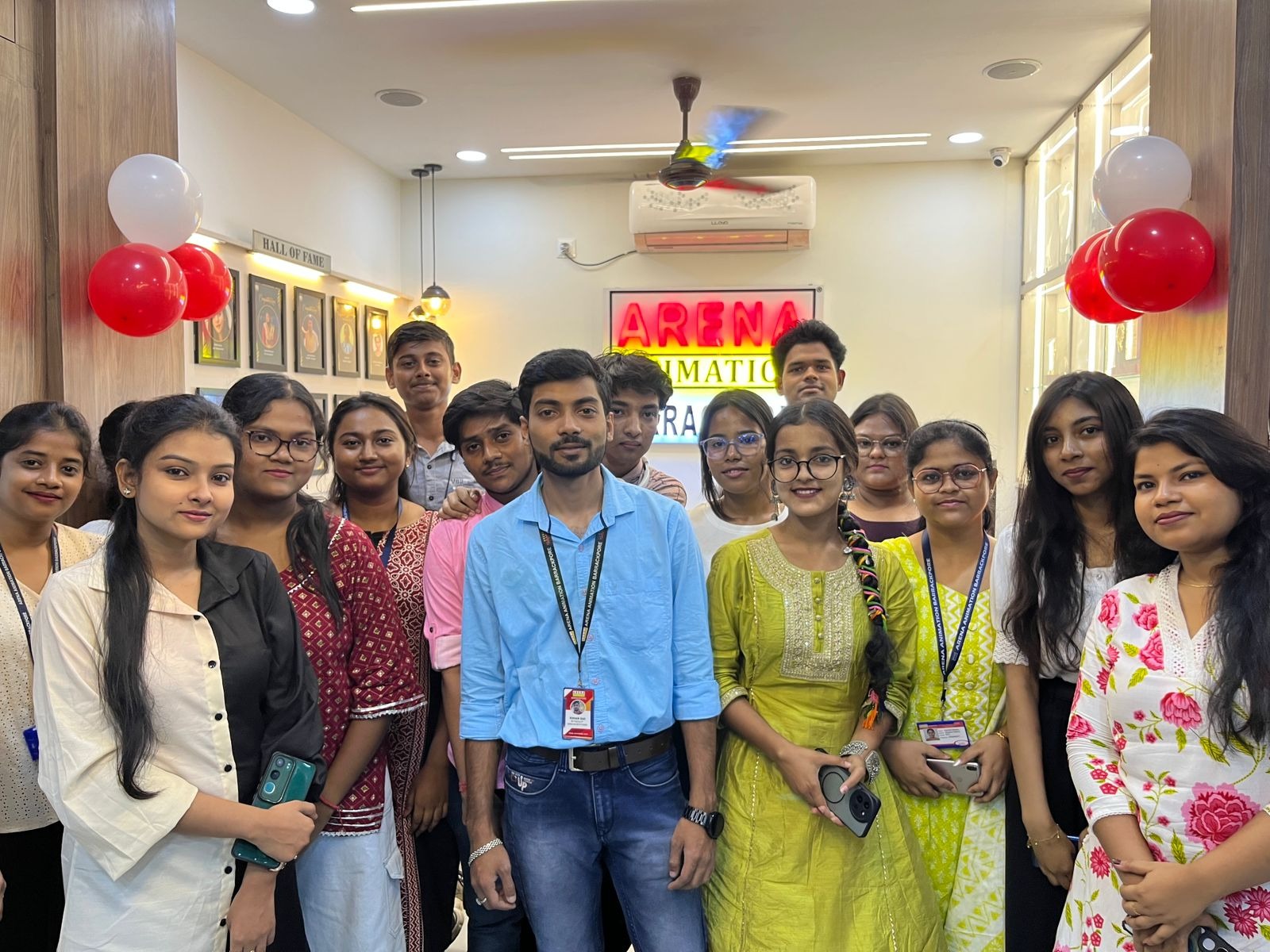Large student batch at Arena signboard