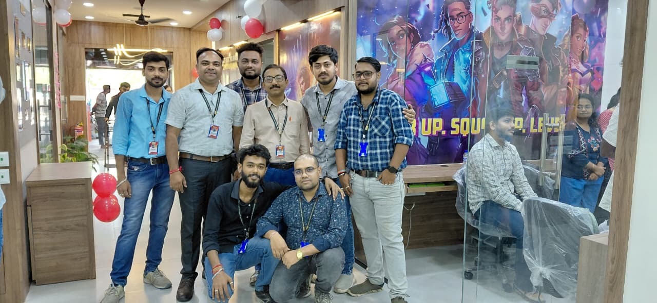 Team group photo at campus entrance